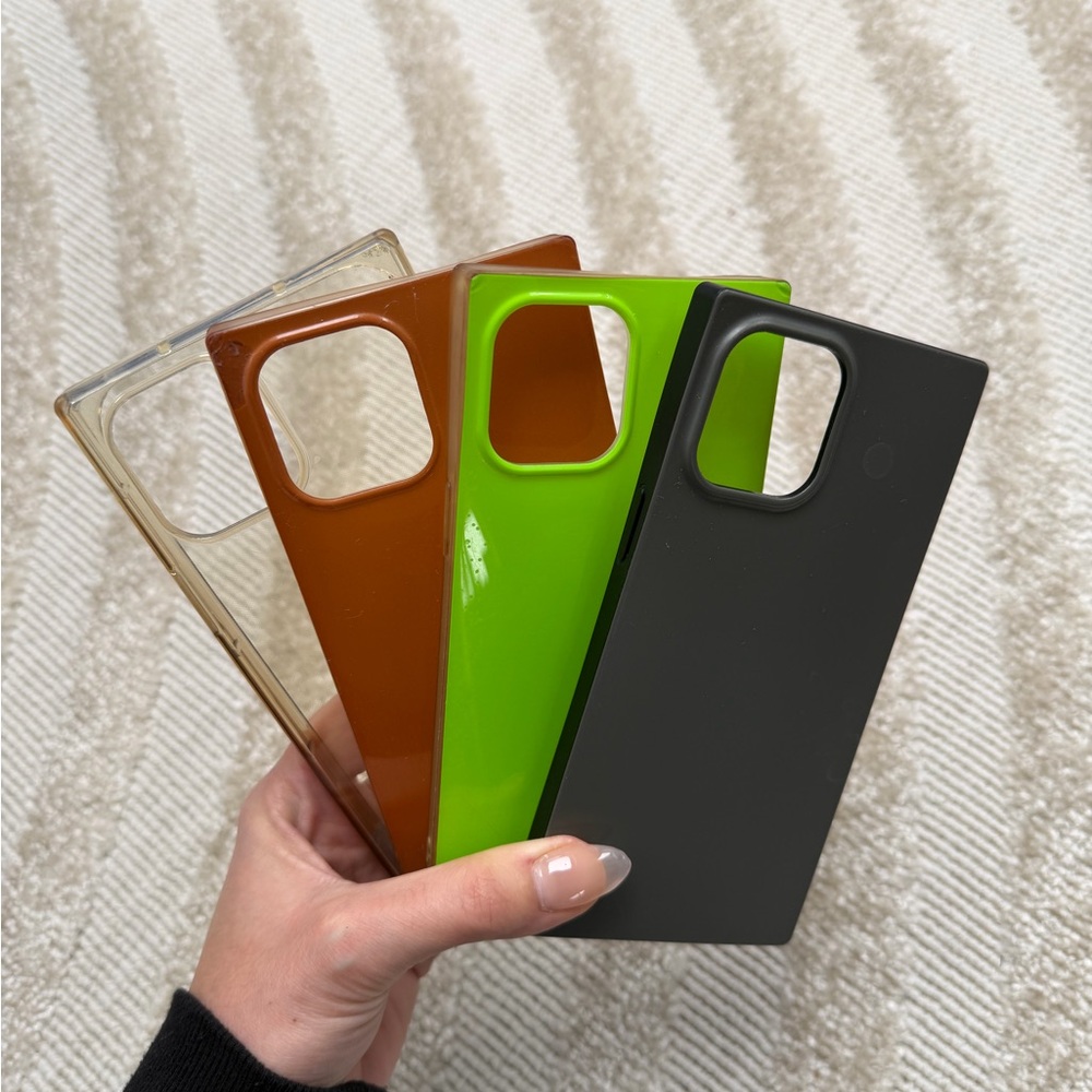 Stylish Phone Case Collection - Black, Green, Brown, and Tan
